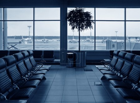 Waiting room airport. blue. planes