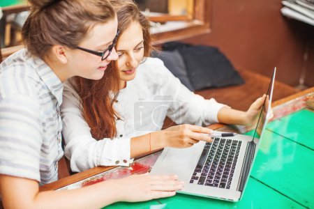 Women looking at computer