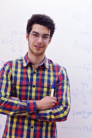 Teenage boy  on chemistry classes