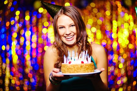 Woman with birthday cake