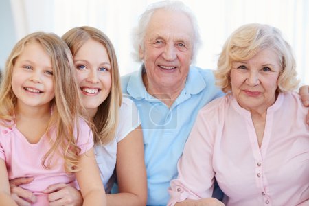 Senior couple with daughter and granddaughter