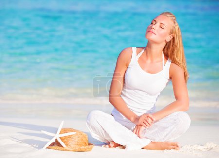 Gentle woman on the beach