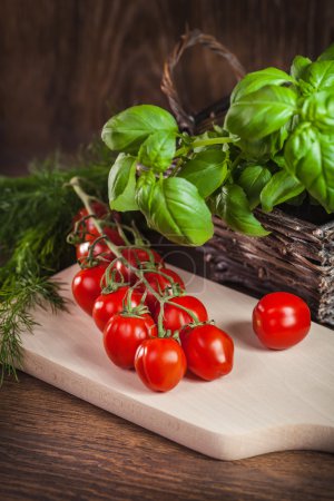 Cherry tomatoes and fresh herbs
