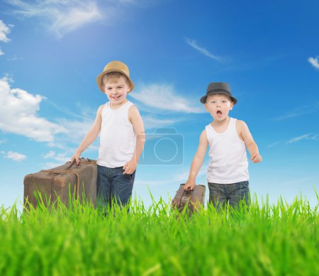 Fancy picture of two boys running with luggages
