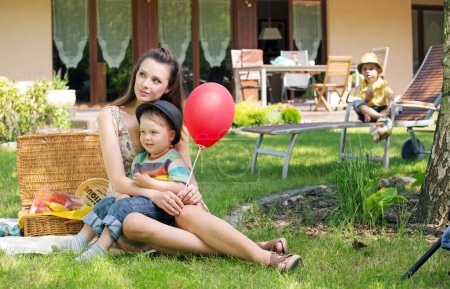 Mother, two kids and the balloon