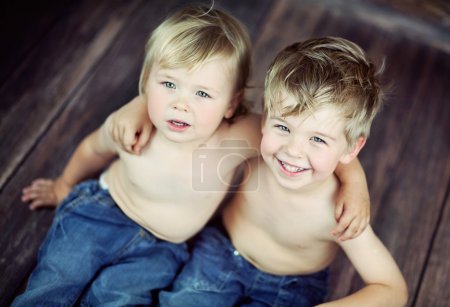 Two little boys on the floor
