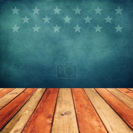 Empty wooden deck table over USA flag background.