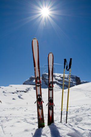 Ski, skiing, winter season , mountains and ski equipment on ski run