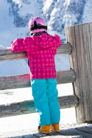 Skiing, kid, winter - young skier on winter vacations