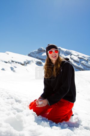 Snowboarder, winter sports - portrait of young snowboarder girl