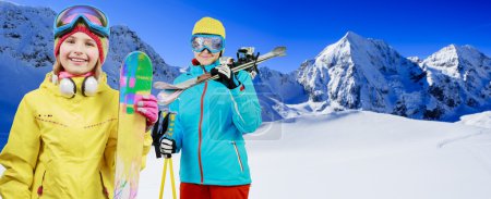 Ski, skier, snow and fun - family enjoying winter vacations