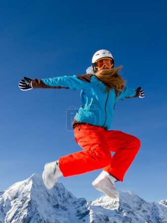 Winter holidays, winter fun- portrait of young snowboarder girl