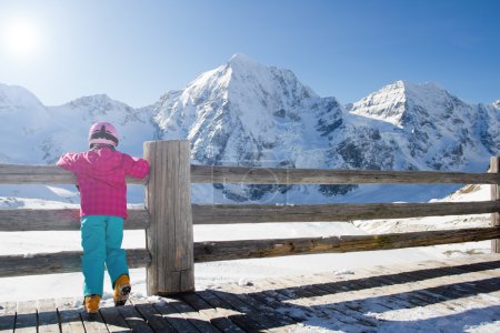 Skiing, kid, winter - young skier on winter vacations