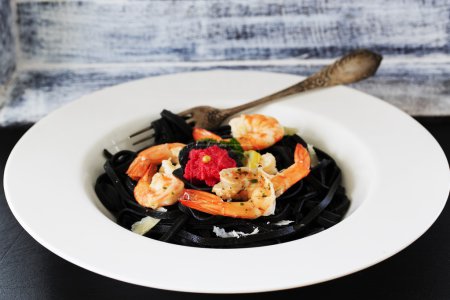 Italian dish - fettuccine with shrimps and caviar