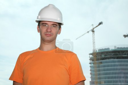 Worker in the helmet