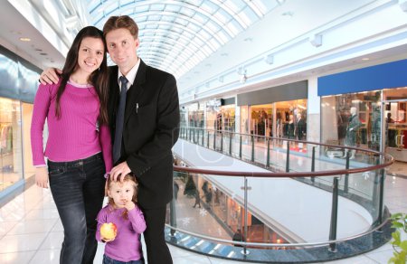 Family with girl in universal store