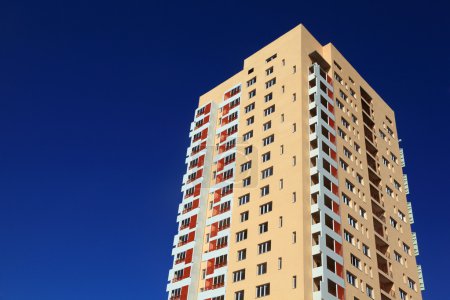 Residental building against dark blue sky