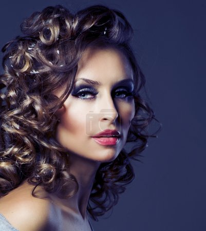 Fashion Beauty Portrait. Healthy Hair. Hairstyle. Holiday Makeup