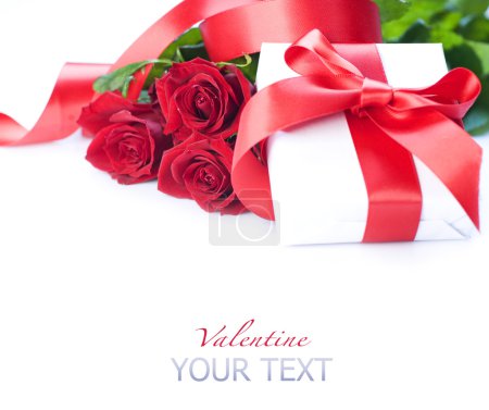 Valentine gift box and red roses bouquet