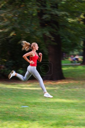 Woman running in a park
