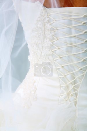 Bride's back in corset