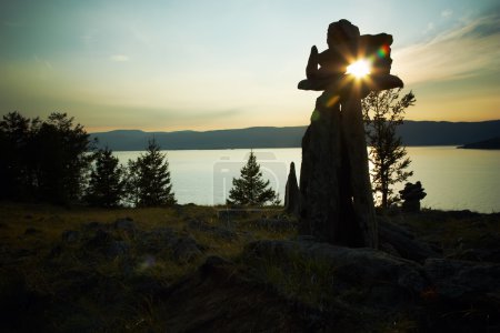 Stone landscape against a decline lake Baikal