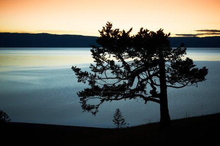 Night landscape against a decline lake Baikal