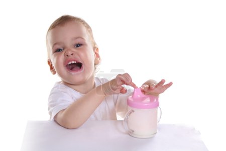 Happy baby with milk