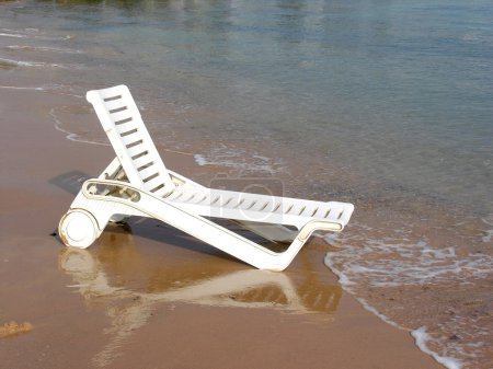 Plank bed on beach