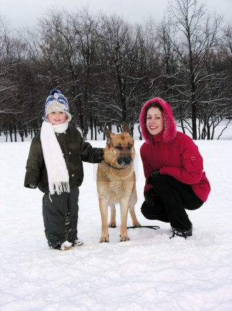 Family with dog. winter