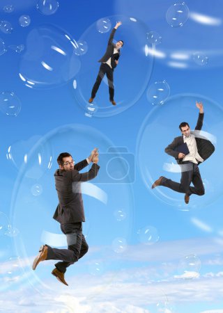 Businessman in flying soap bubbles