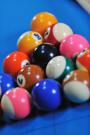 Young man play pro billiard game