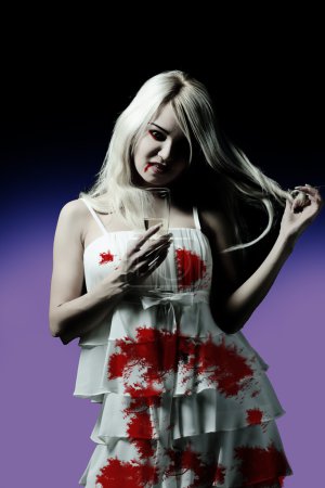 Photo of girl with dress full of blood