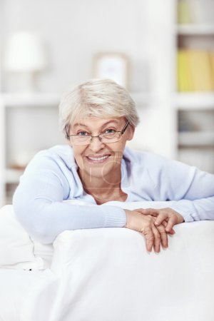 Mature attractive woman at home