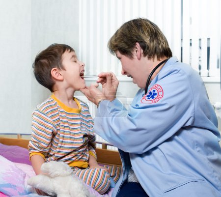 Doctor of ambulance and sick child