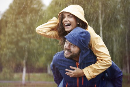 Loving couple in rain
