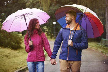 Loving couple with umbrella