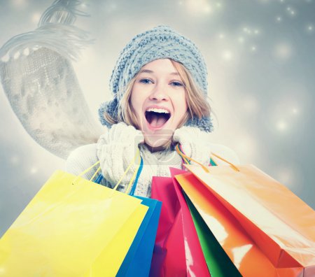 Happy Young Woman with Shopping Bag