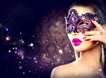 Sexy woman wearing carnival mask