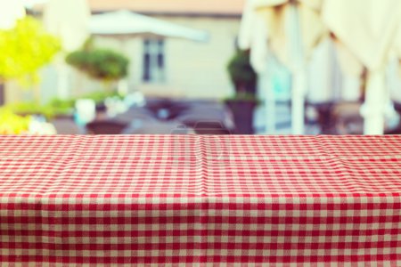 Table with red checked tablecloth