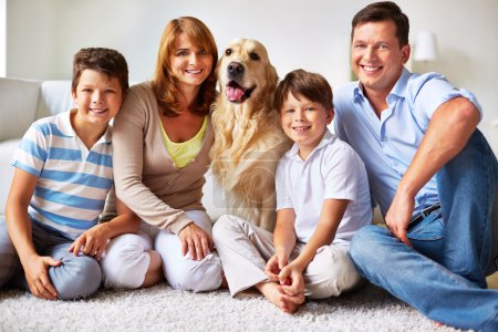 Happy family with dog