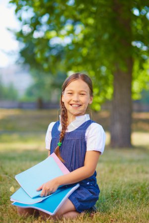 Schoolgirl with copybooks