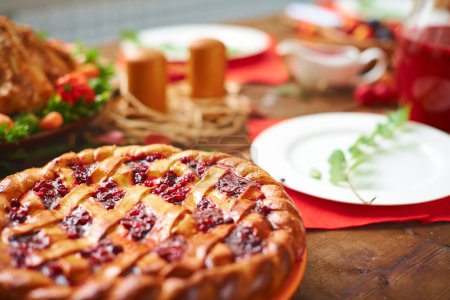 Homemade pie with cowberry jam