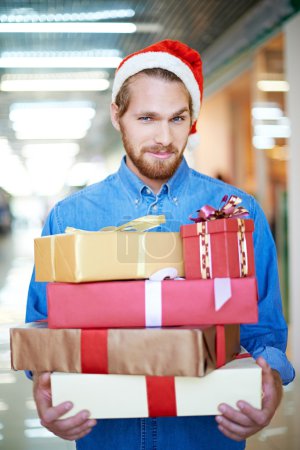Man holding gift boxes
