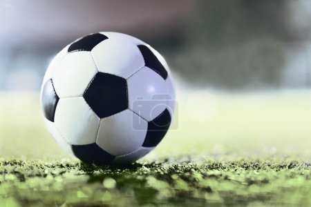 Soccer ball on sports field