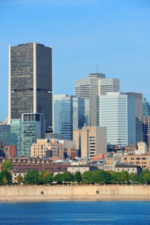 Montreal city skyline over river 