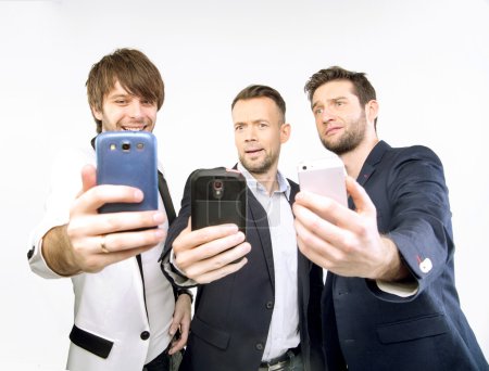 A few guys uisng their smart phones