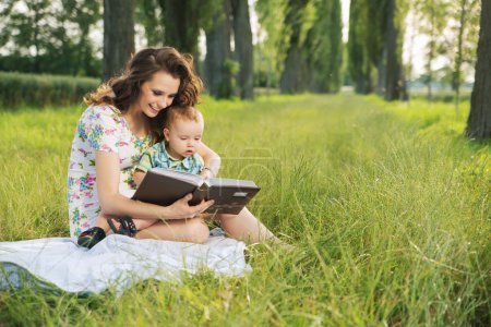 Brunette  mother reading tales for her child