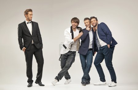 Laughing guys in elegant clothes