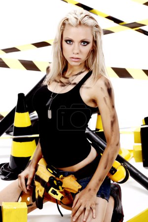 Sexy blonde female construction worker